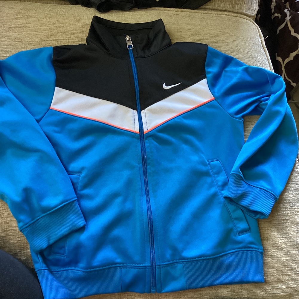 Boys size 7 Nike light jacket blue and black
